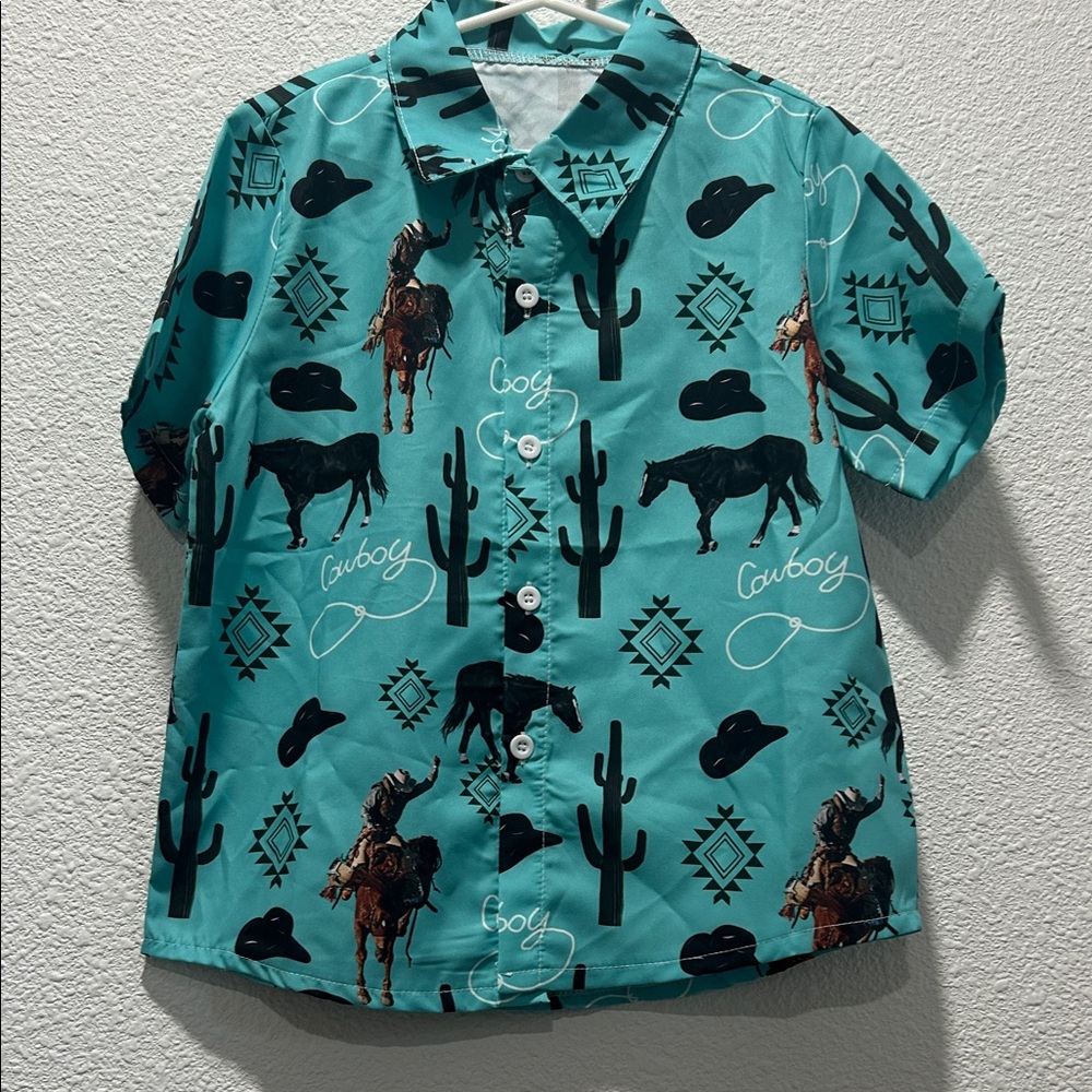 BOGO free 


Source Unknown Turquoise Western Kids Shirt Size 7/8